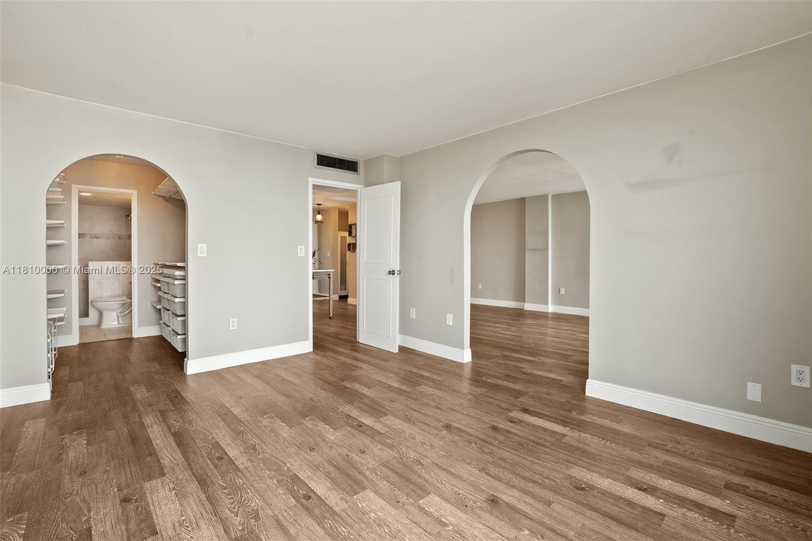 150 Southeast 25th Road, Unit 10K Miami, FL 33129 - Photo 13 of 43 wooden floor in an empty room with a window