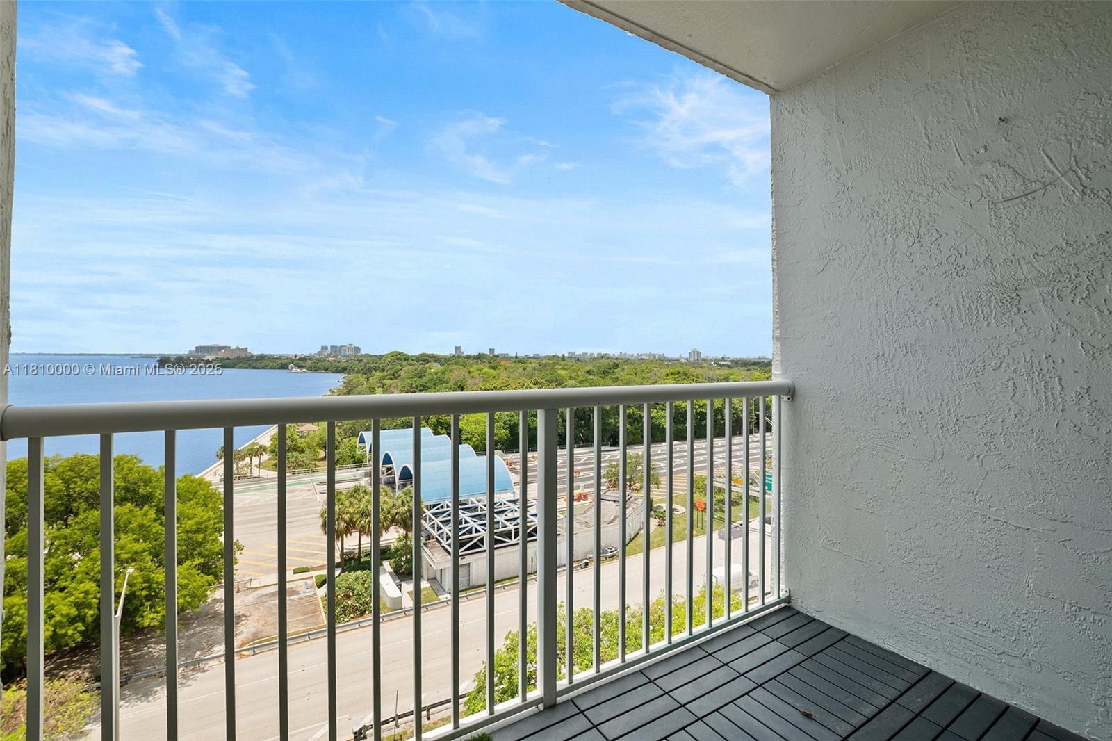 150 Southeast 25th Road, Unit 10K Miami, FL 33129 - Photo 21 of 43 a view of a balcony with wooden floor