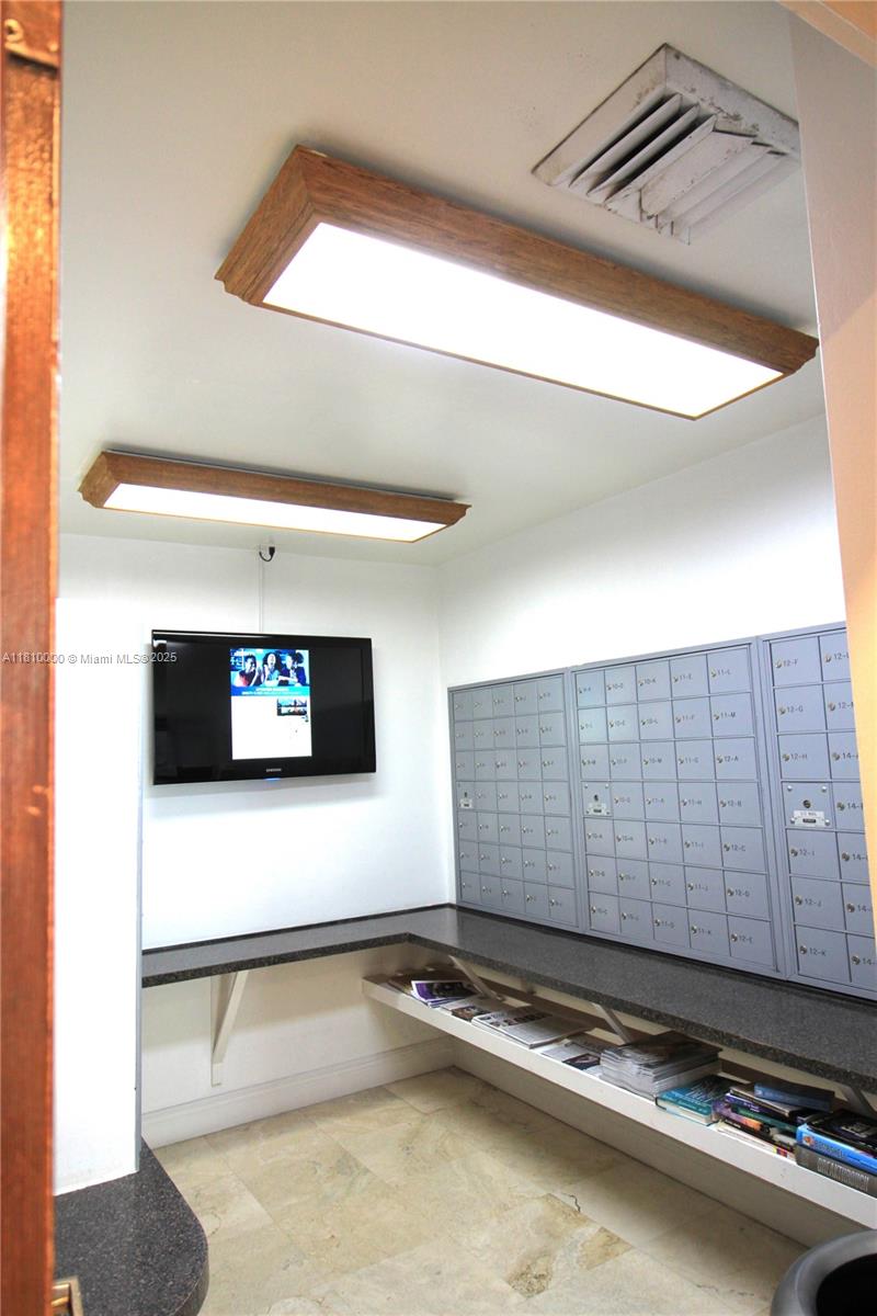 150 Southeast 25th Road, Unit 10K Miami, FL 33129 - Photo 29 of 43 a view of a projector room