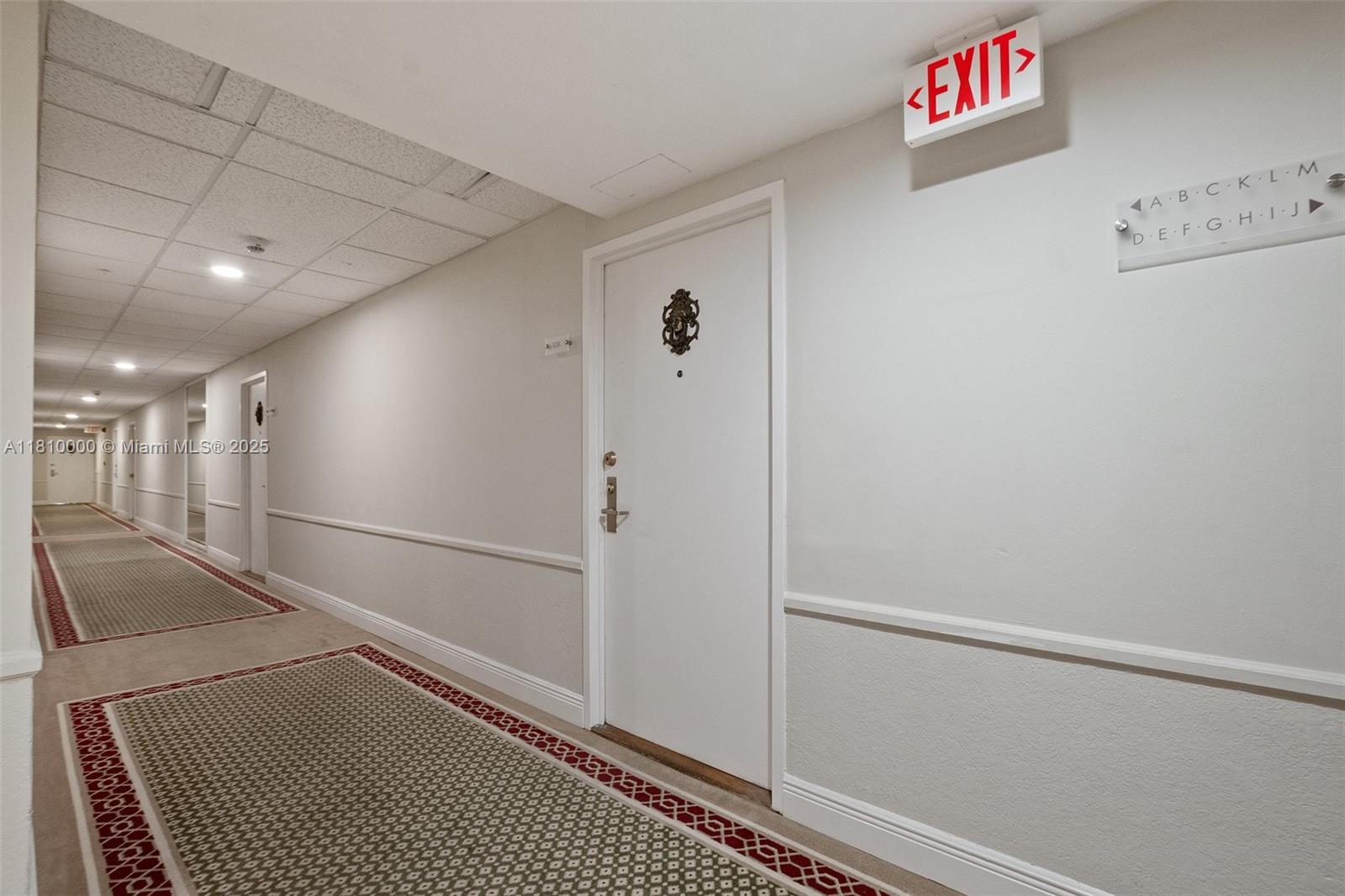 150 Southeast 25th Road, Unit 10K Miami, FL 33129 - Photo 43 of 43 a view of a hallway with a refrigerator