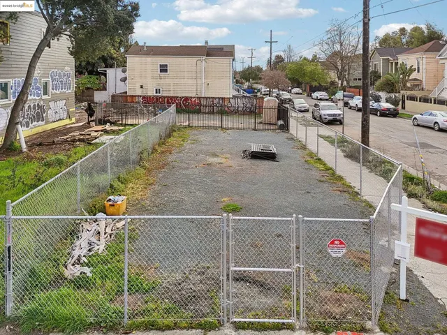 a view of a chairs and bench in the patio