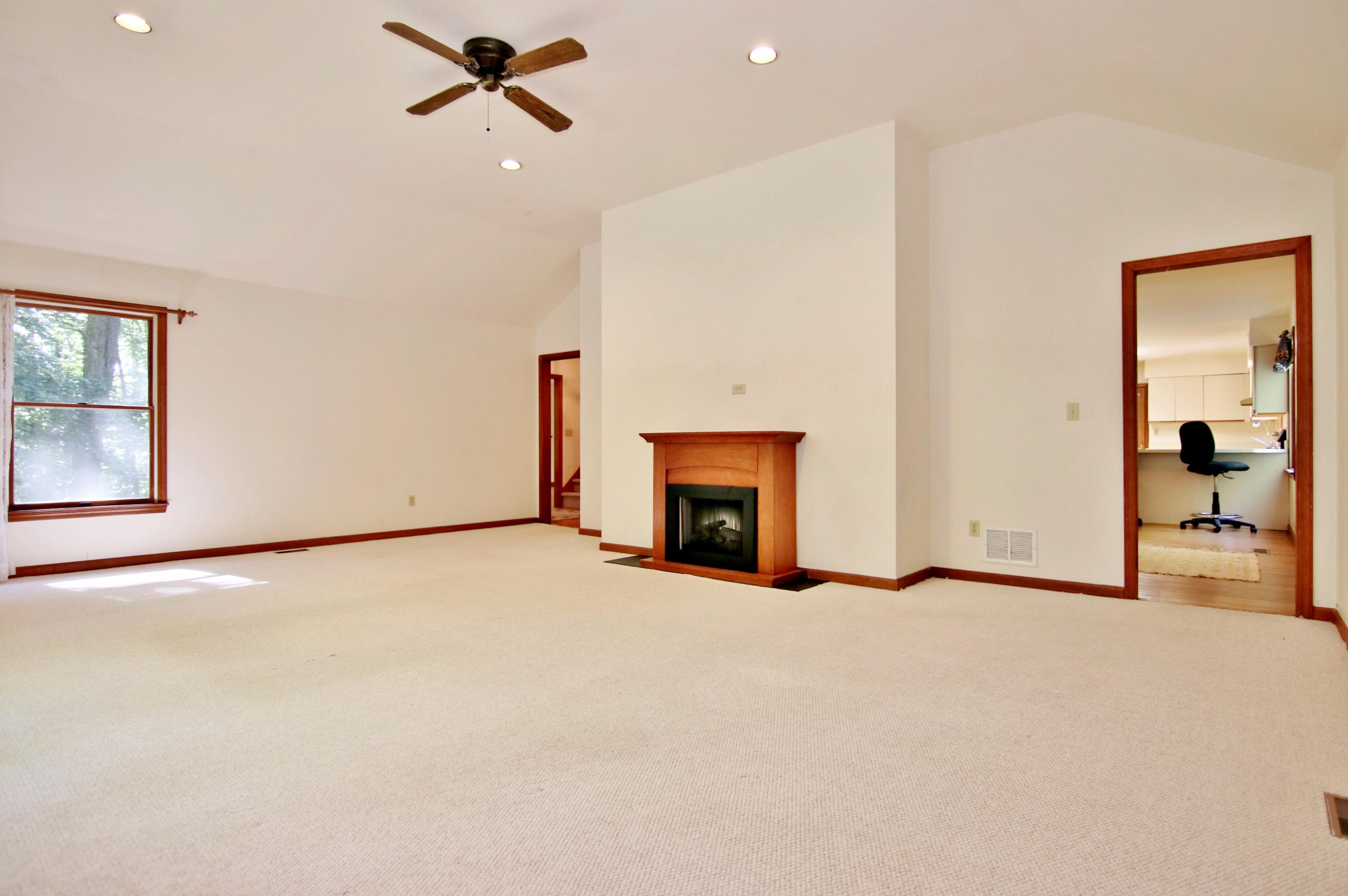 838 Valley Road New Canaan, CT 06840 - Photo 21 of 44 a view of empty room with a fireplace