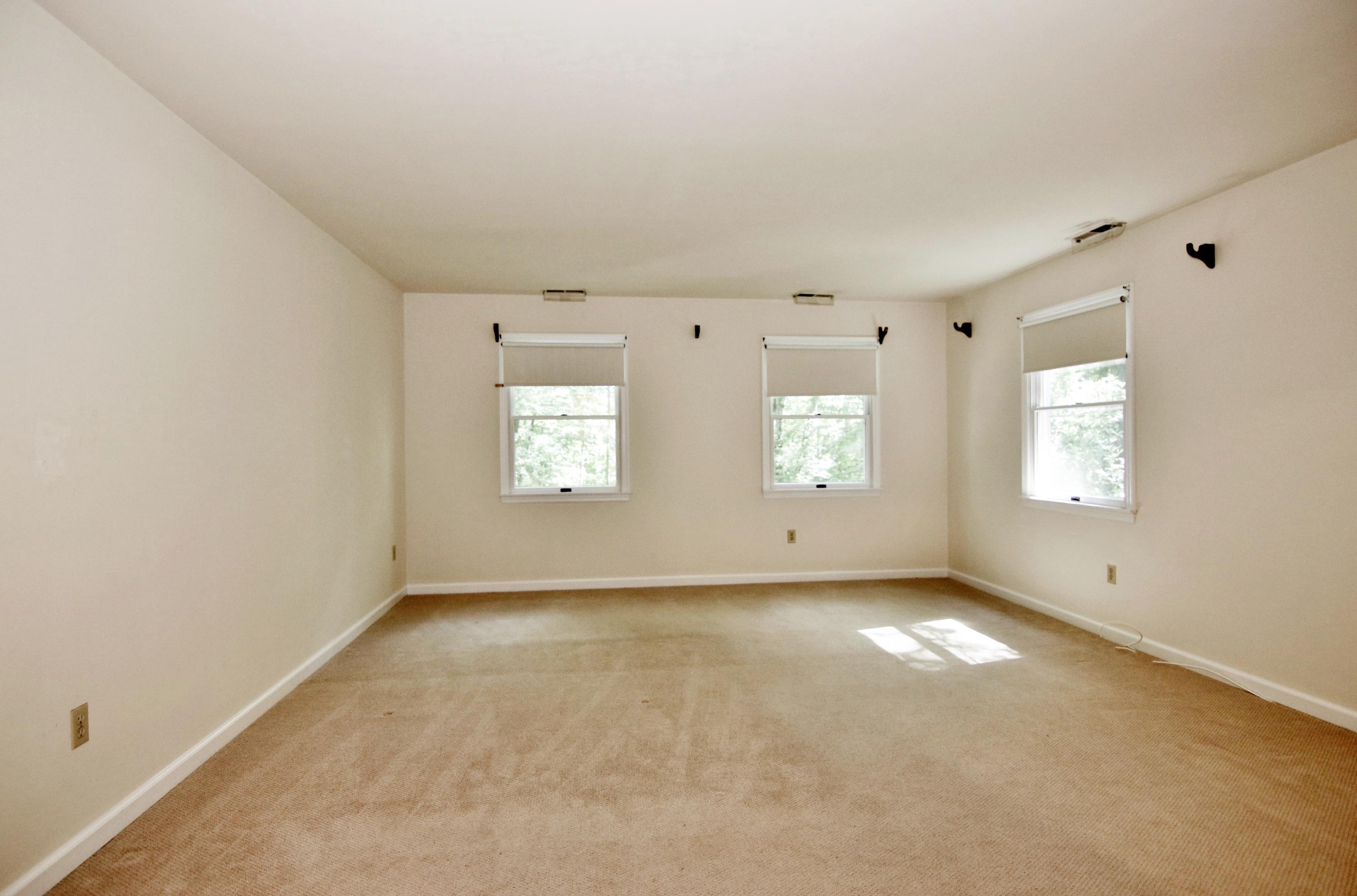 838 Valley Road New Canaan, CT 06840 - Photo 28 of 44 an empty room with windows