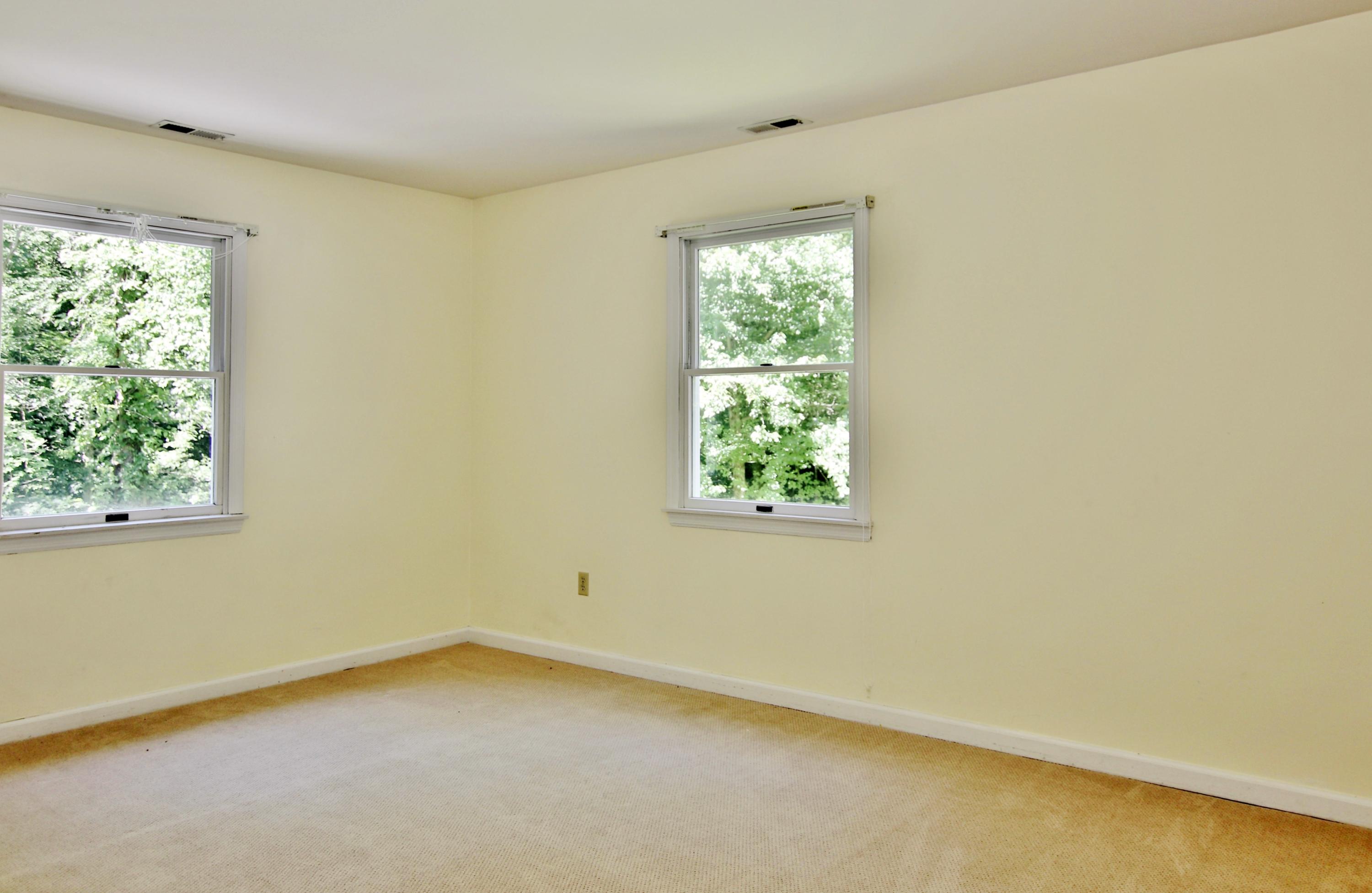 838 Valley Road New Canaan, CT 06840 - Photo 30 of 44 an empty room with a window