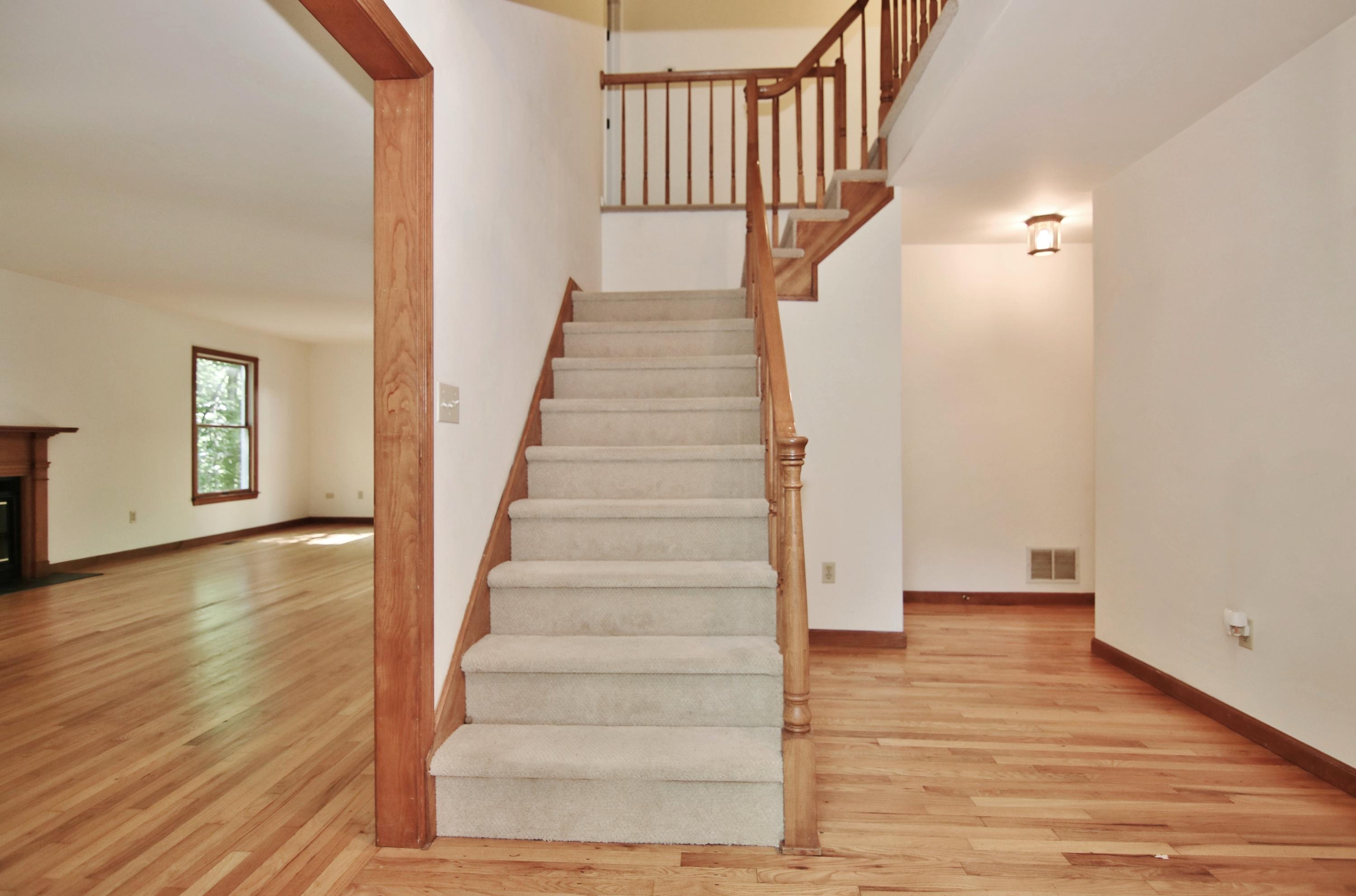 838 Valley Road New Canaan, CT 06840 - Photo 6 of 44 a view of entryway and hall with wooden floor