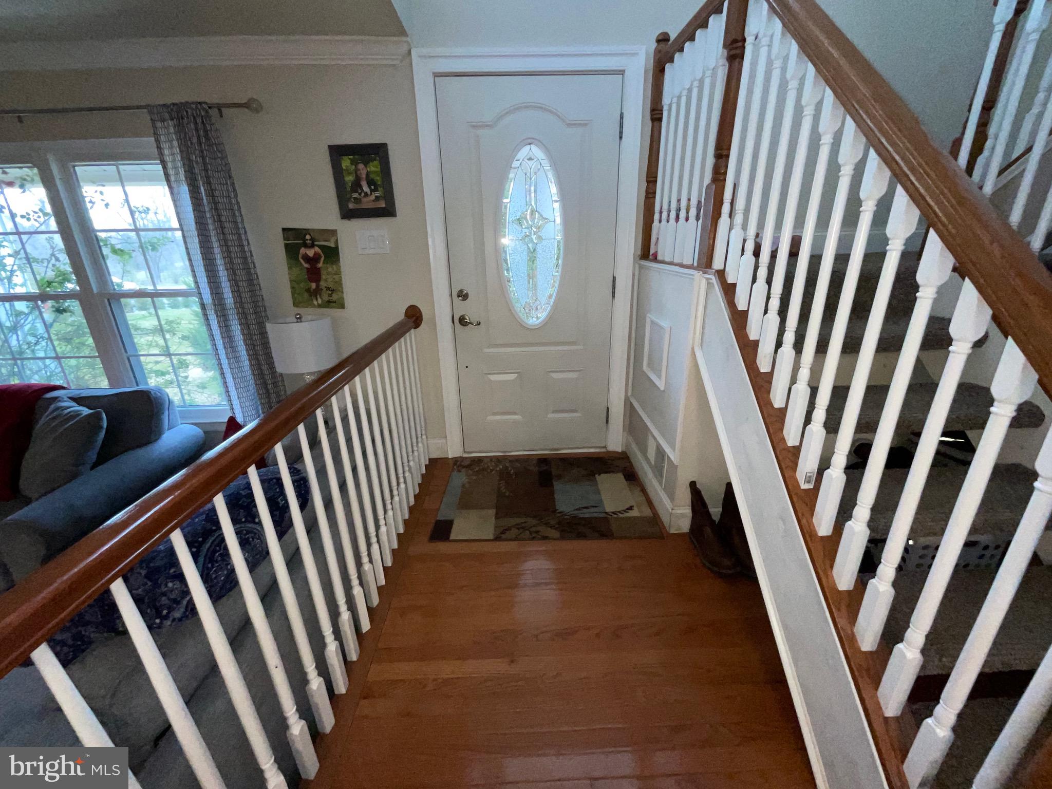 342 Oaktree Lane Sterling, VA 20164 - Photo 2 of 22 Replaced wood floor