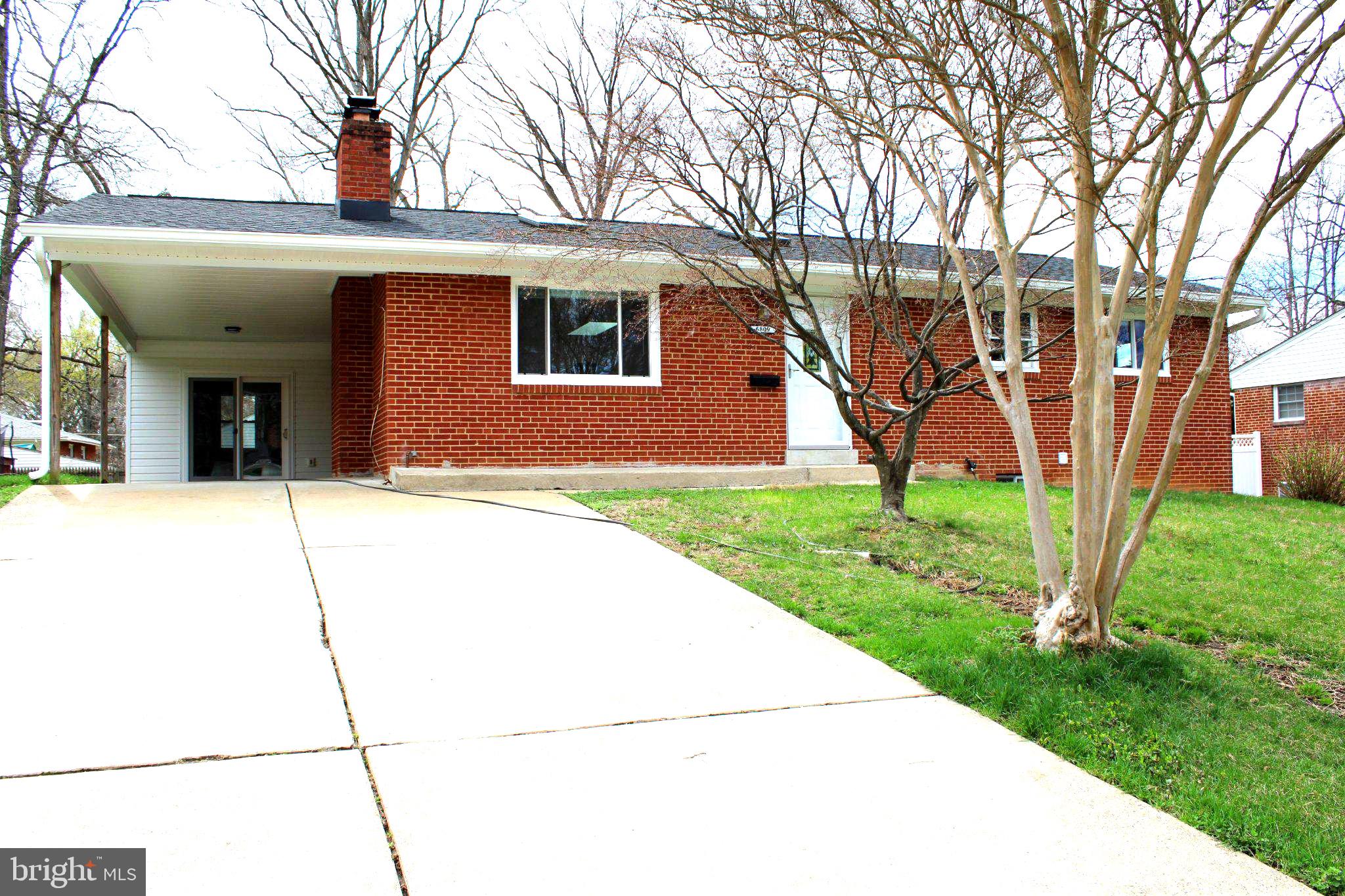 6809 Ruskin Street Springfield, VA 22150 - Photo 2 of 39 Charming brick home with inviting curb appeal.