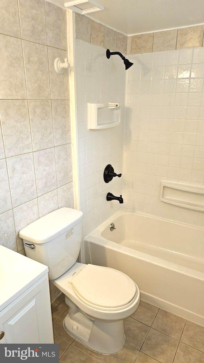 6809 Ruskin Street Springfield, VA 22150 - Photo 24 of 39 Modern bathroom with sleek finishes.