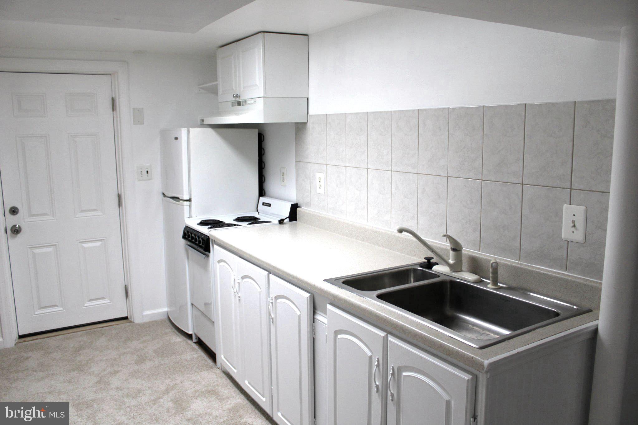 6809 Ruskin Street Springfield, VA 22150 - Photo 33 of 39 Bright and functional kitchen space.