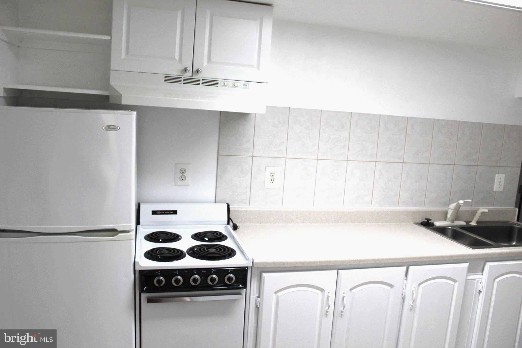 6809 Ruskin Street Springfield, VA 22150 - Photo 34 of 39 Bright and functional kitchen space.