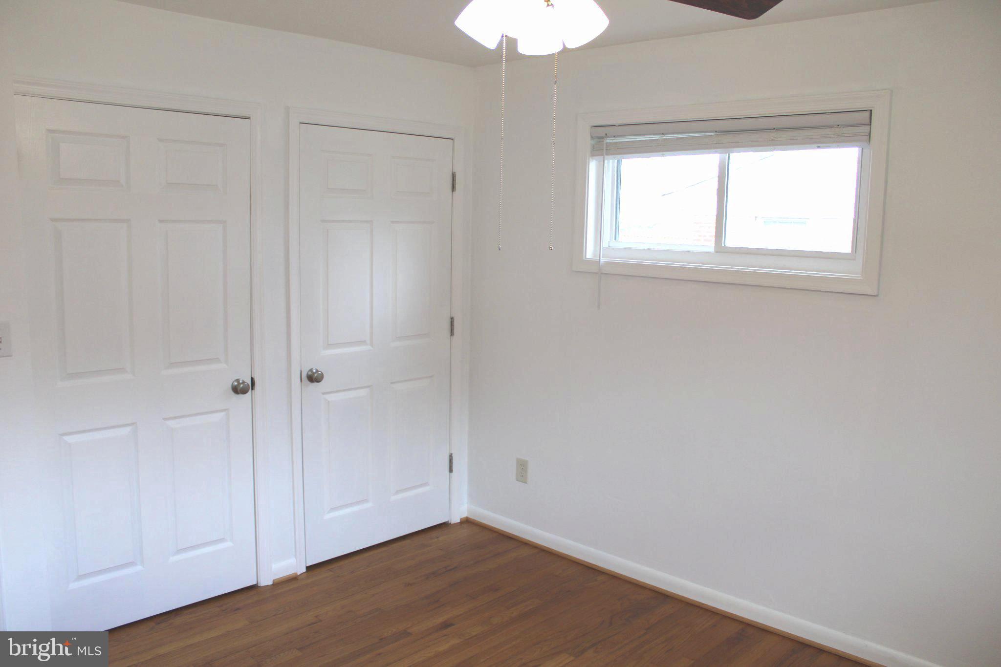 6809 Ruskin Street Springfield, VA 22150 - Photo 35 of 39 Bright and airy room with dual closets.