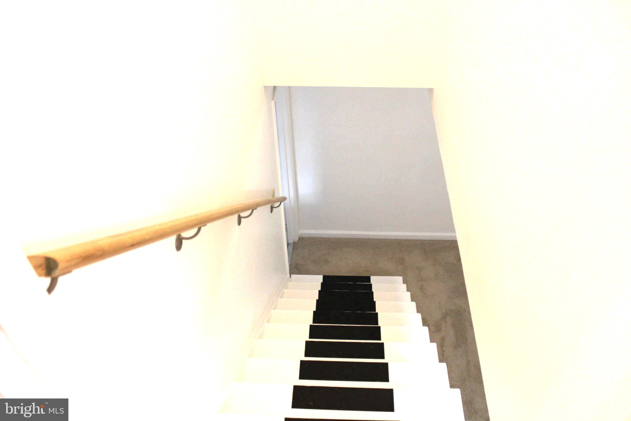 6809 Ruskin Street Springfield, VA 22150 - Photo 38 of 39 Inviting staircase to new beginnings.