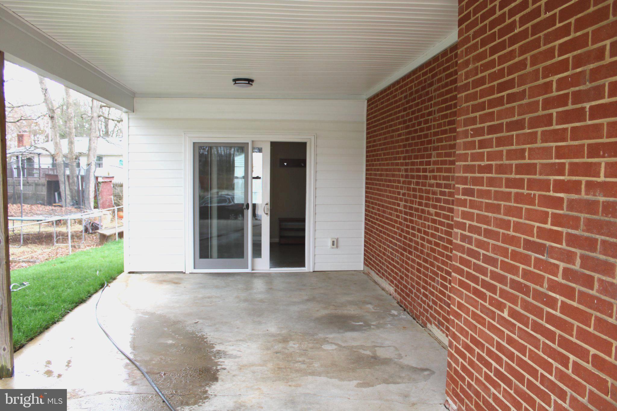 6809 Ruskin Street Springfield, VA 22150 - Photo 4 of 39 Inviting entryway with brick accents.