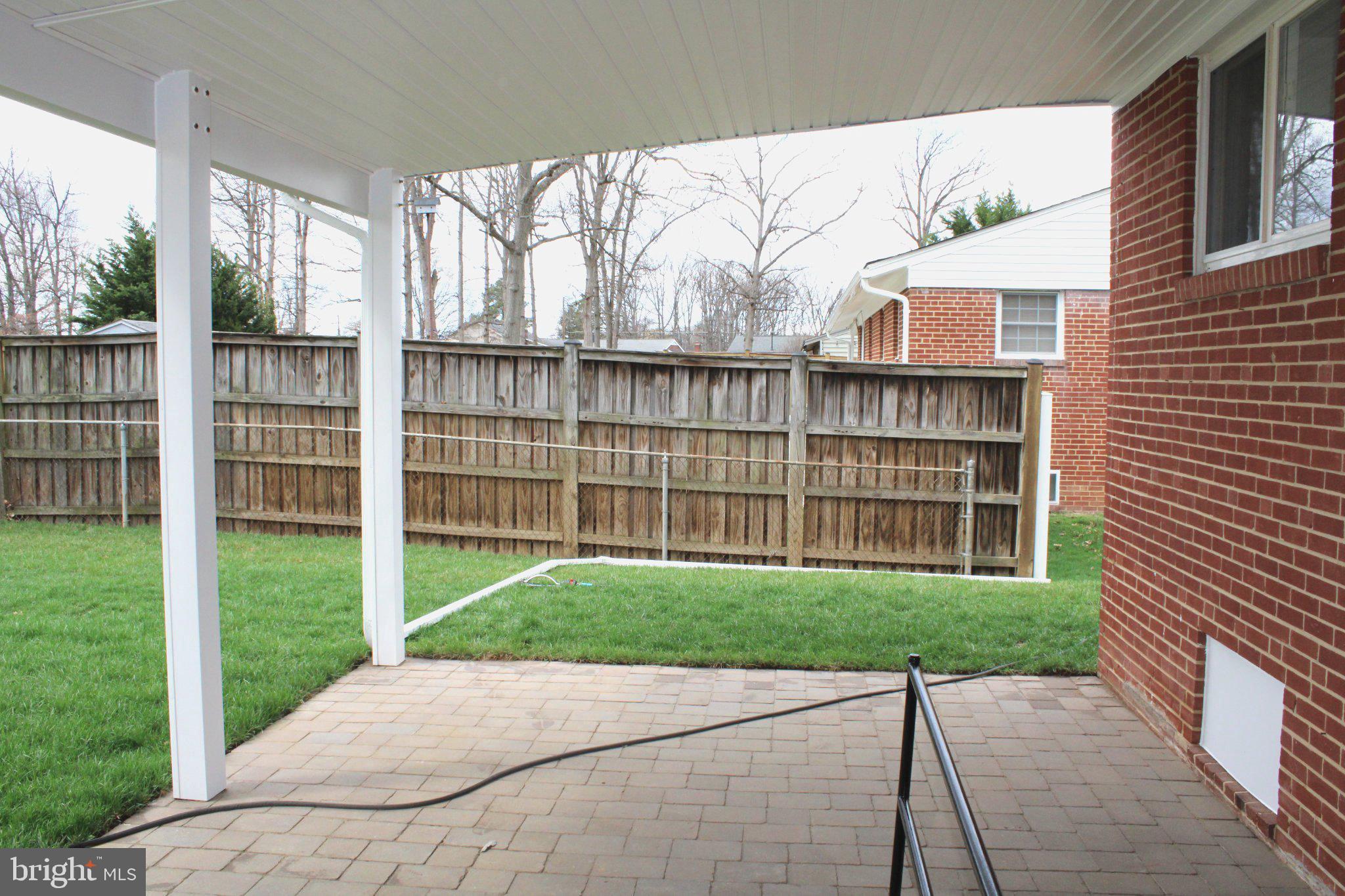 6809 Ruskin Street Springfield, VA 22150 - Photo 10 of 39 Charming patio with serene views.