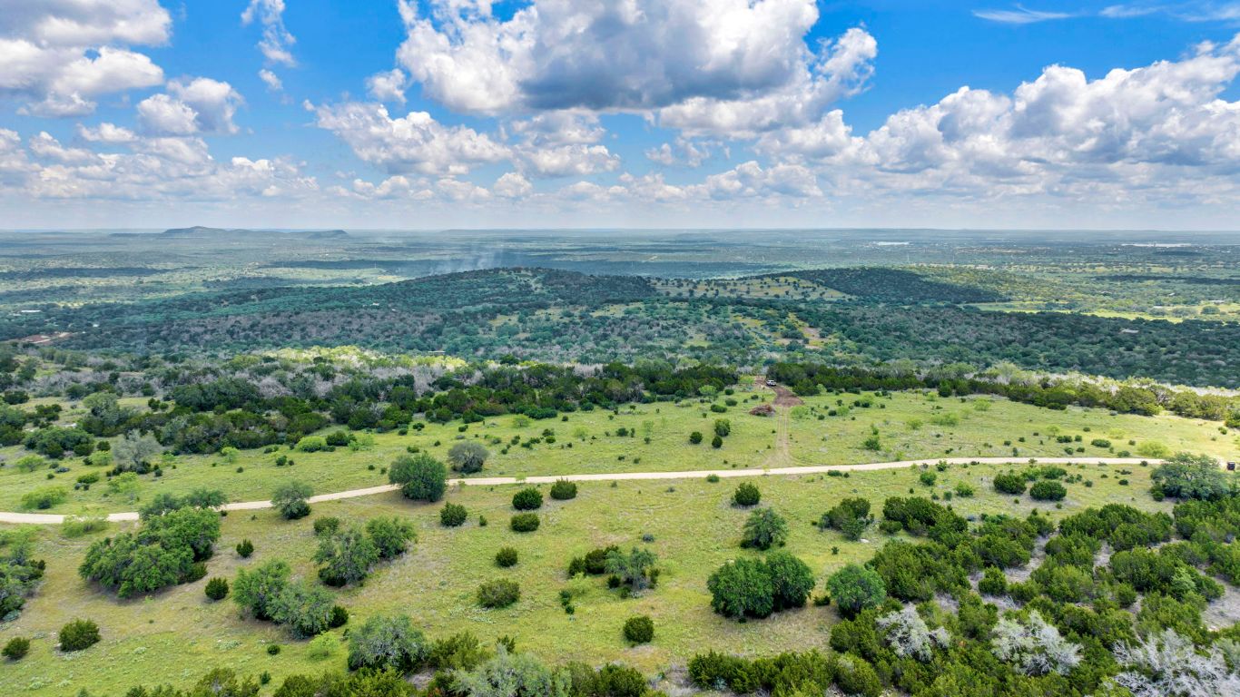 3531 Rr 3347 Round Mountain Round Mountain, TX 78663 - Photo 5 of 14 a view of a bunch of trees and cars