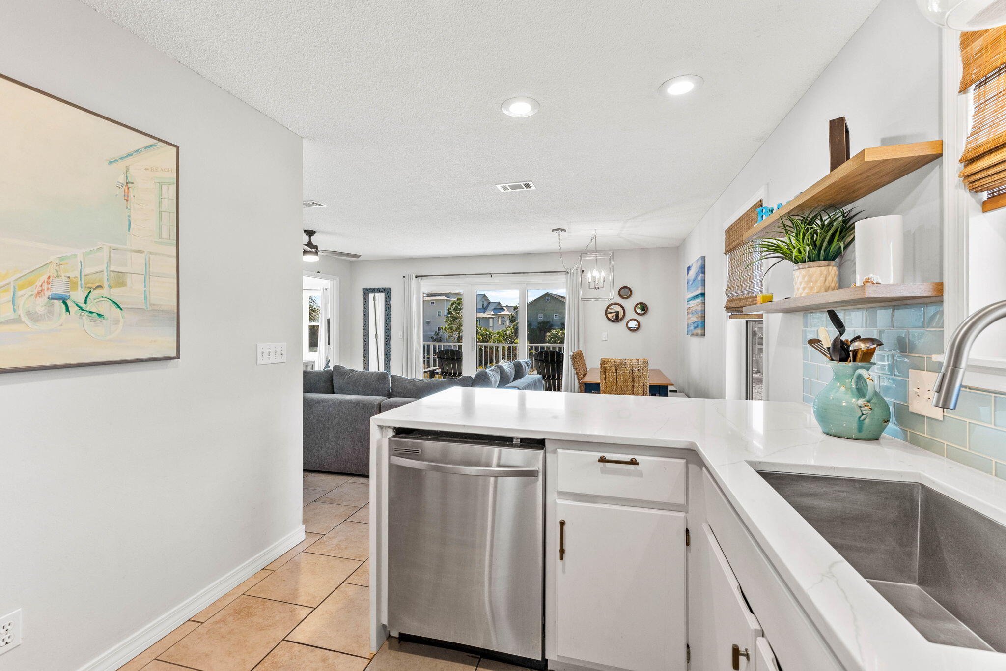 11 Beachside Drive, Unit 1121 Santa Rosa Beach, FL 32459 - Photo 12 of 43 a view of a kitchen with a sink and a refrigerator