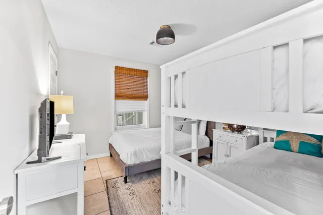 a kitchen with a sink and a refrigerator