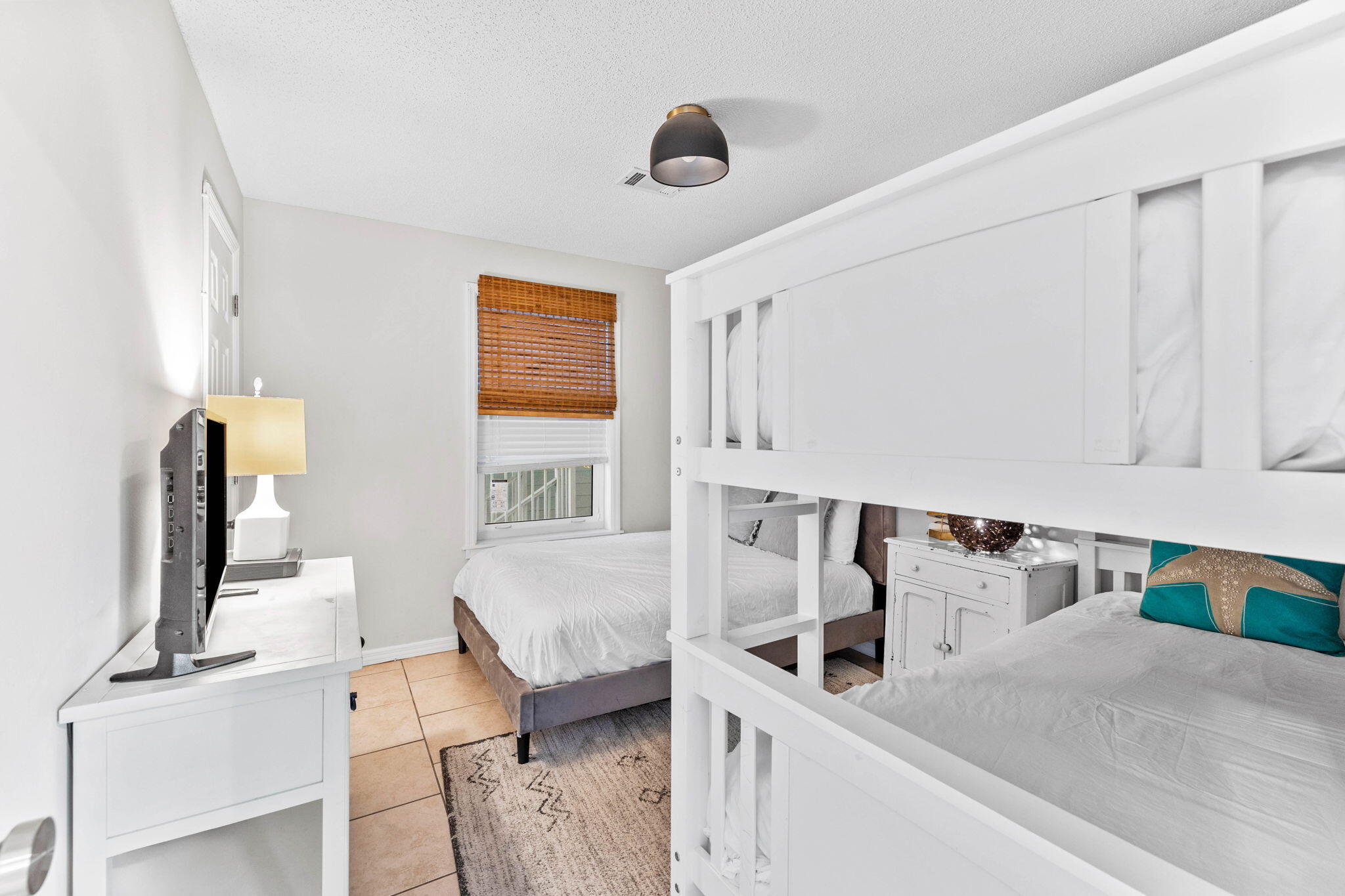 11 Beachside Drive, Unit 1121 Santa Rosa Beach, FL 32459 - Photo 13 of 43 a kitchen with a sink and a refrigerator