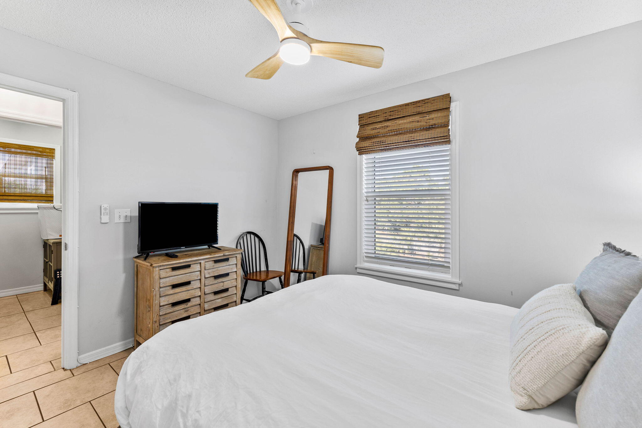 11 Beachside Drive, Unit 1121 Santa Rosa Beach, FL 32459 - Photo 16 of 43 a bedroom with a bed and a flat screen tv