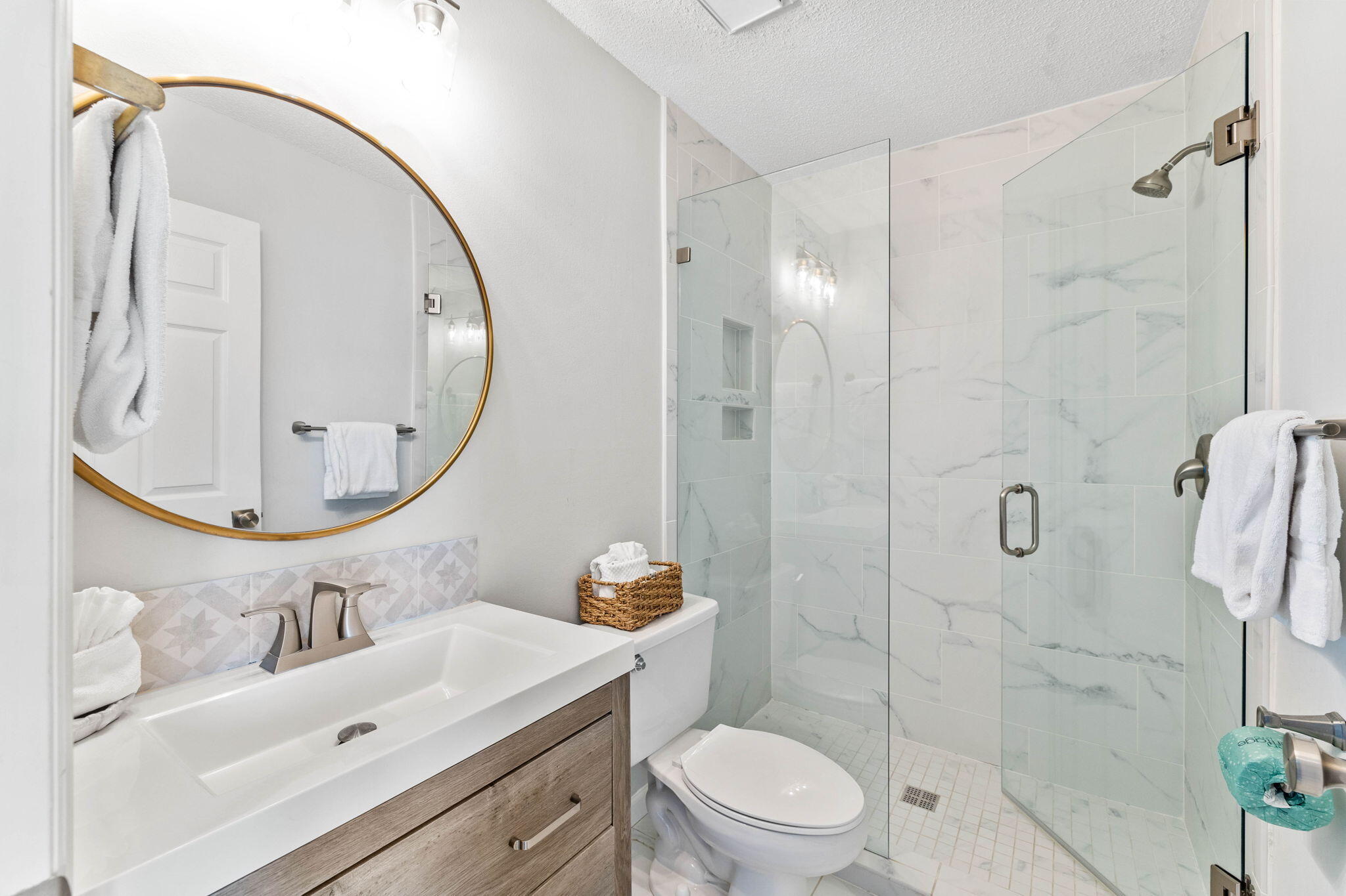 11 Beachside Drive, Unit 1121 Santa Rosa Beach, FL 32459 - Photo 21 of 43 a bathroom with a sink a toilet and shower