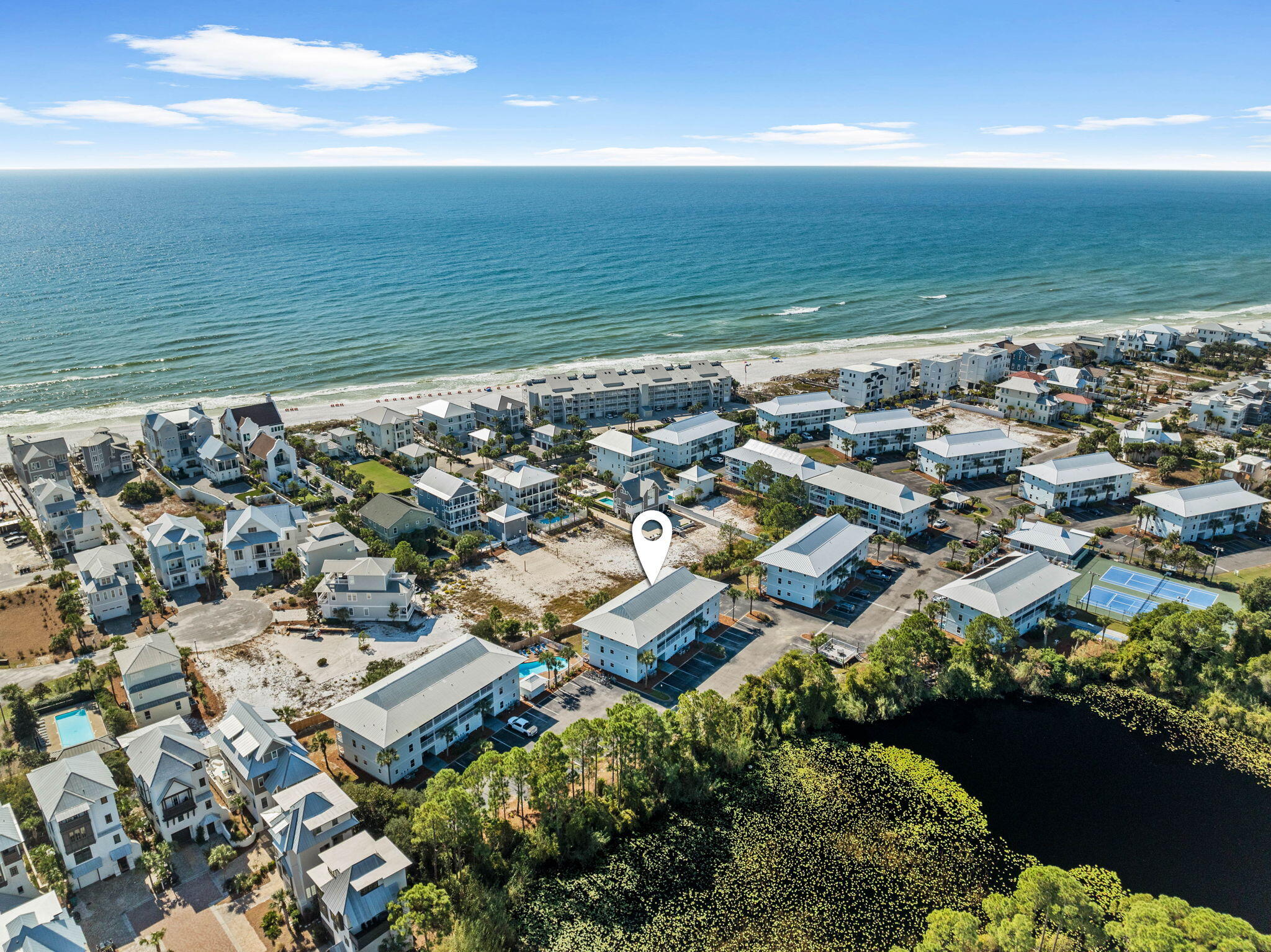 11 Beachside Drive, Unit 1121 Santa Rosa Beach, FL 32459 - Photo 25 of 43 an aerial view of ocean and residential houses with outdoor space