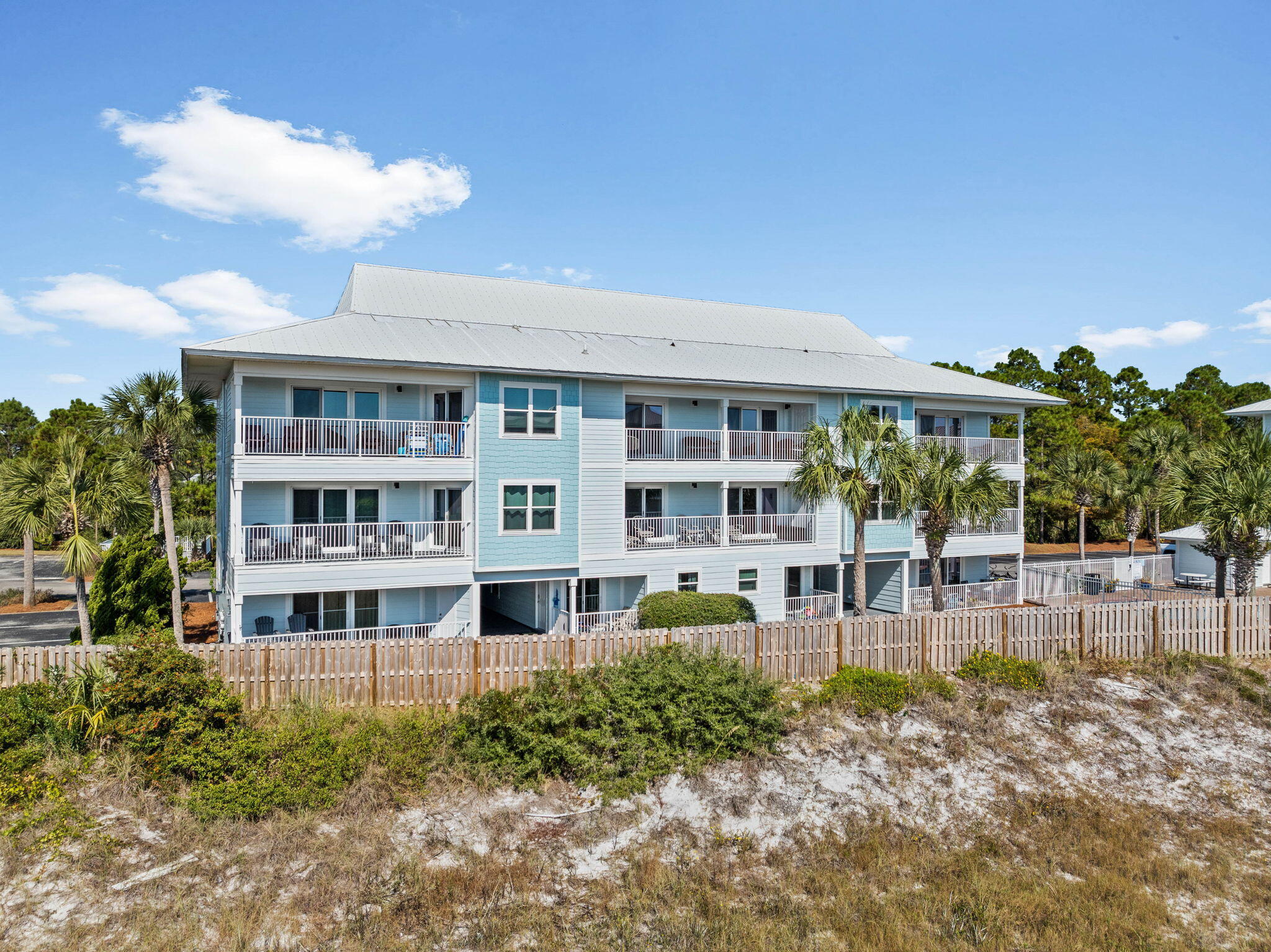 11 Beachside Drive, Unit 1121 Santa Rosa Beach, FL 32459 - Photo 31 of 43 a front view of building with yard