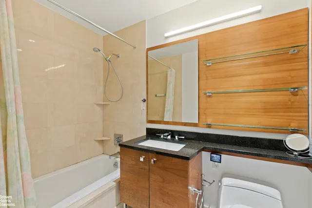 a kitchen with a sink stove and refrigerator