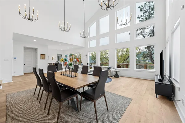 a view of a dining room with furniture window and outside view