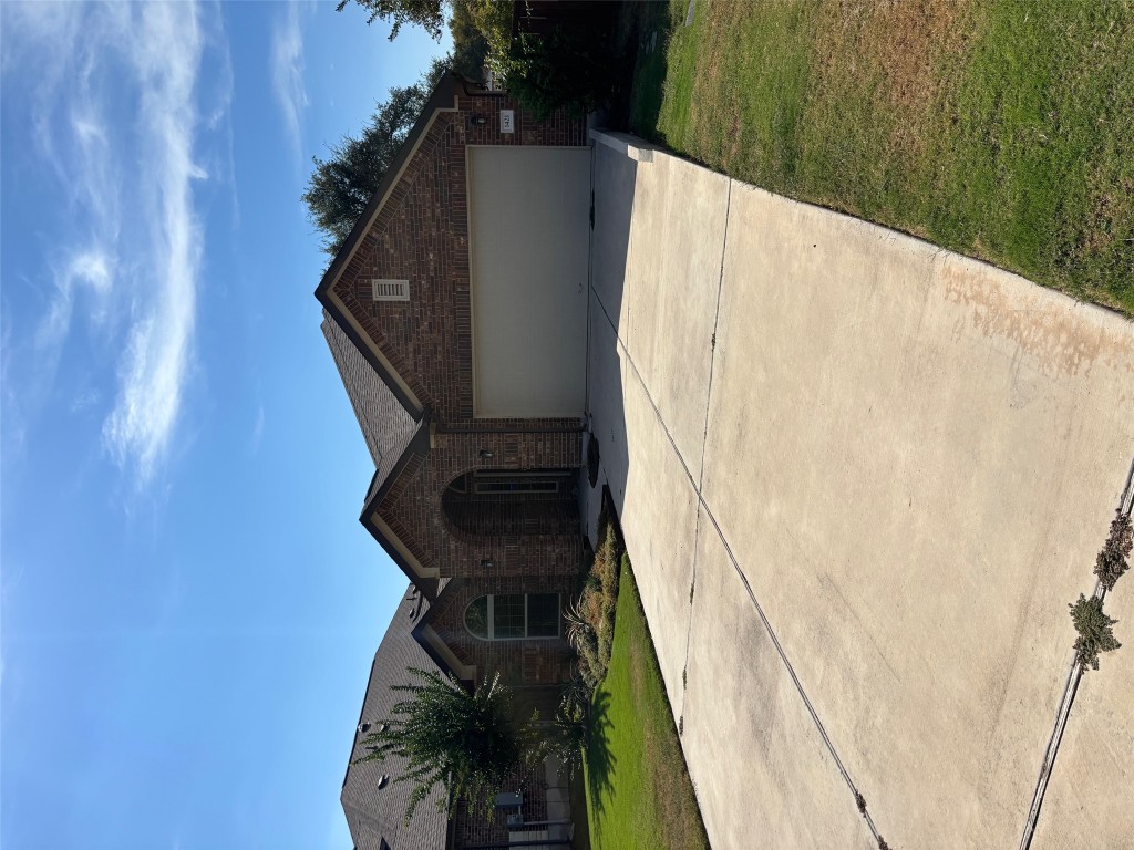 1421 Morning View Road Georgetown, TX 78628 - Photo 1 of 39 a front view of a house with a yard
