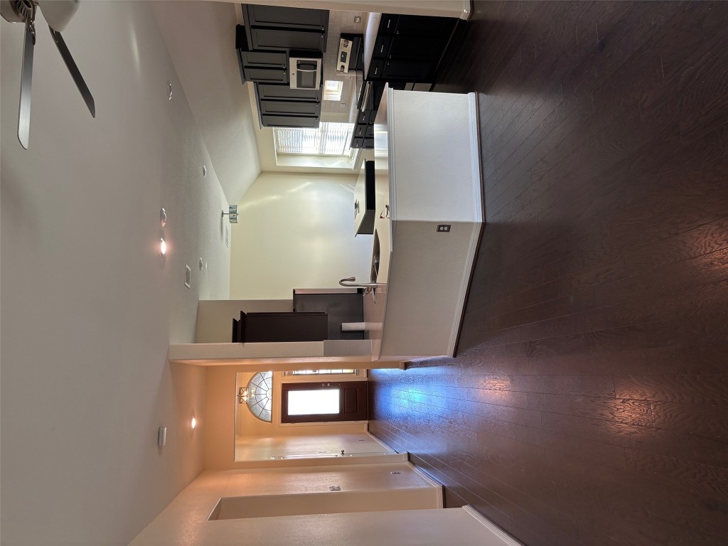 1421 Morning View Road Georgetown, TX 78628 - Photo 12 of 39 a view of a kitchen with a sink wooden cabinets and a window