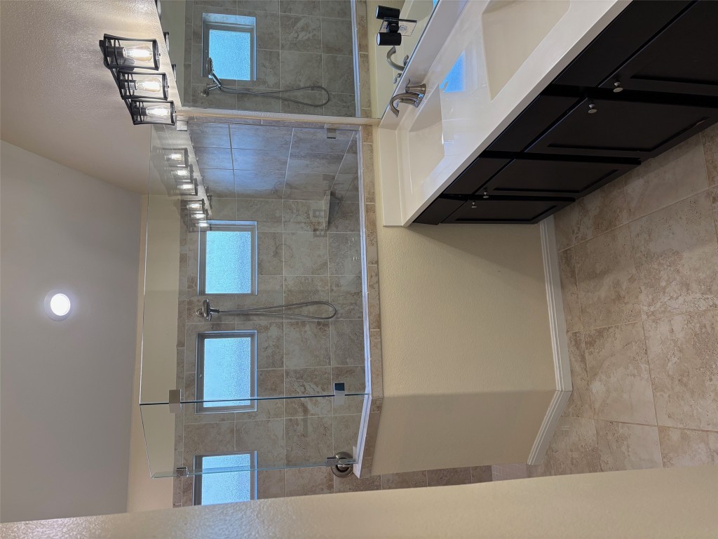 1421 Morning View Road Georgetown, TX 78628 - Photo 17 of 39 a kitchen with a sink and cabinets