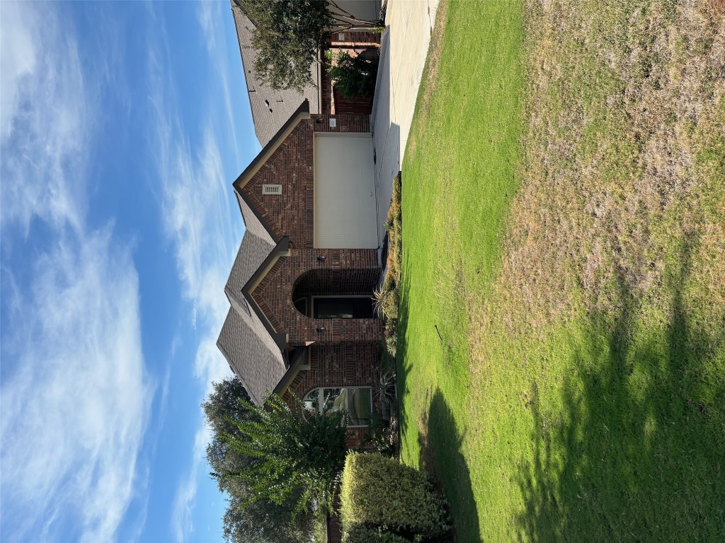 1421 Morning View Road Georgetown, TX 78628 - Photo 2 of 39 a front view of a house with yard and green space