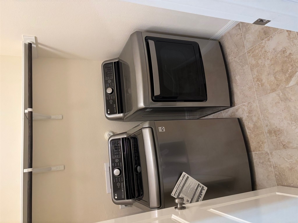 1421 Morning View Road Georgetown, TX 78628 - Photo 22 of 39 a utility room with dryer and washer
