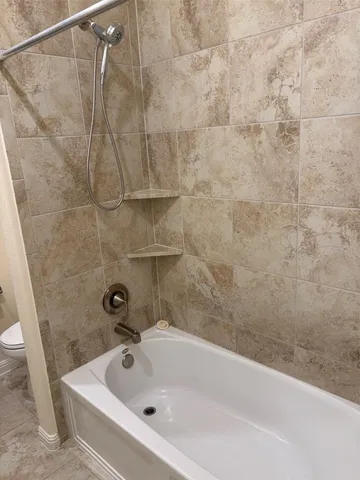 a bathroom with a bathtub