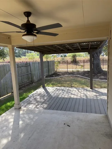 a view of swimming pool with a backyard
