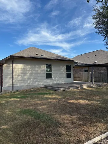a view of outdoor space with deck and trees