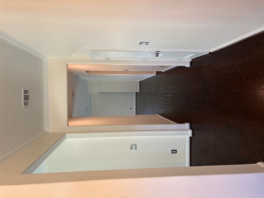 1421 Morning View Road Georgetown, TX 78628 - Photo 4 of 39 a view of a hallway with wooden floor