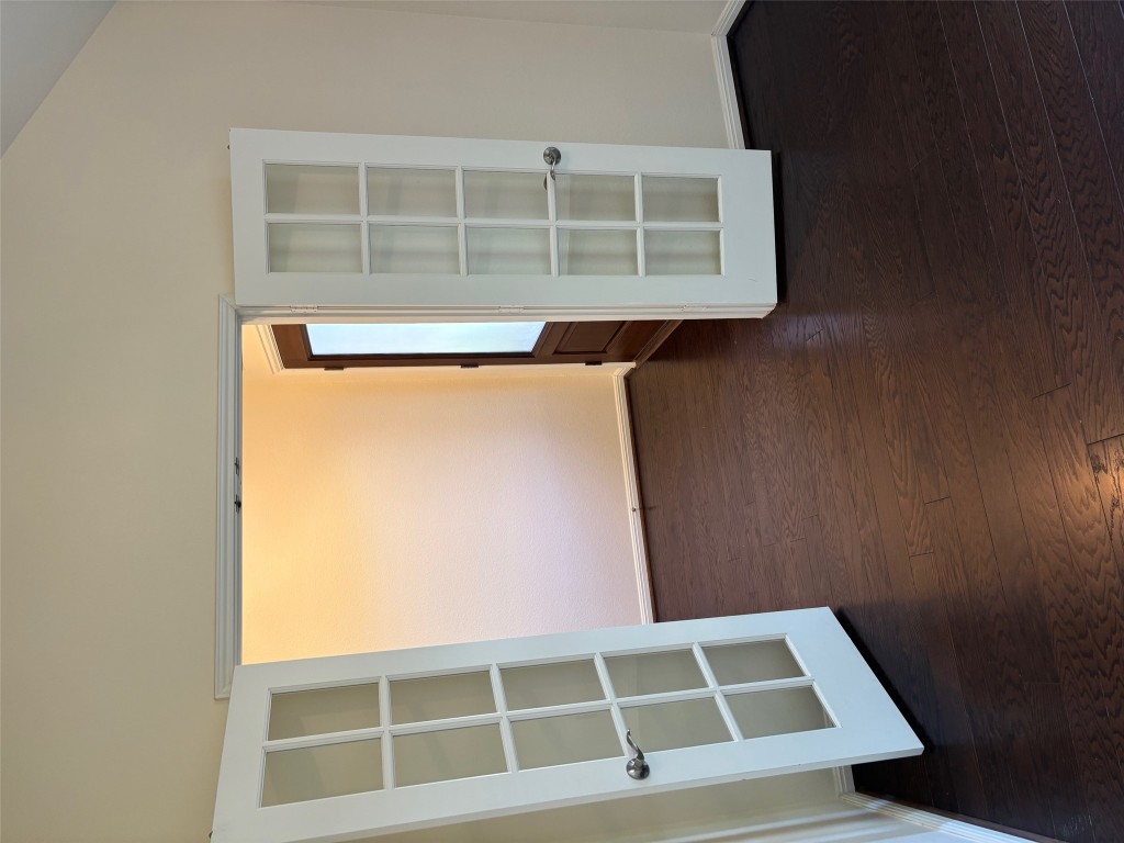 1421 Morning View Road Georgetown, TX 78628 - Photo 6 of 39 an empty room with wooden floor and windows