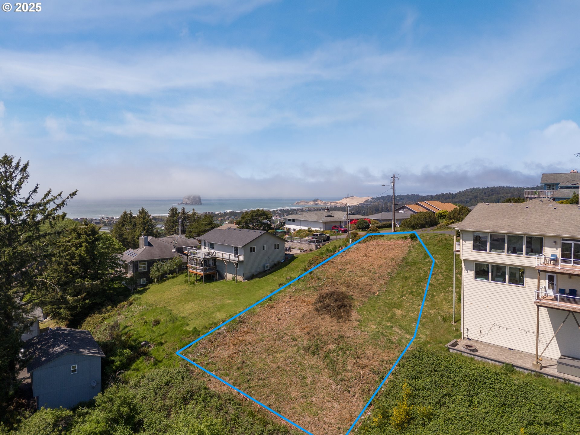 14901 East Summit Road Pacific City, OR 97135 - Photo 5 of 6 an aerial view of residential houses with outdoor space