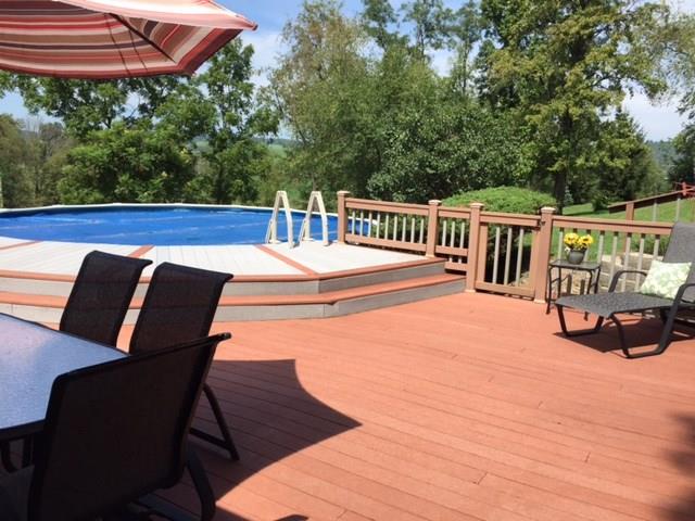 356 Willow Road Avella, PA 15312 - Photo 21 of 25 Trex Deck surrounding pool