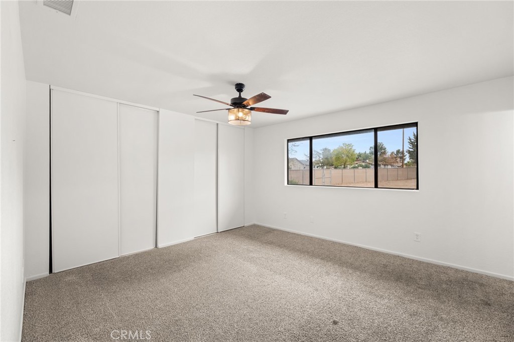 17805 Walnut Street Hesperia, CA 92345 - Photo 11 of 18 a view of an empty room with a window