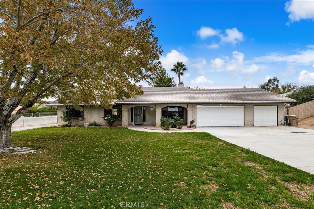 17805 Walnut Street Hesperia, CA 92345 - Photo 2 of 18 front view of a house with a yard