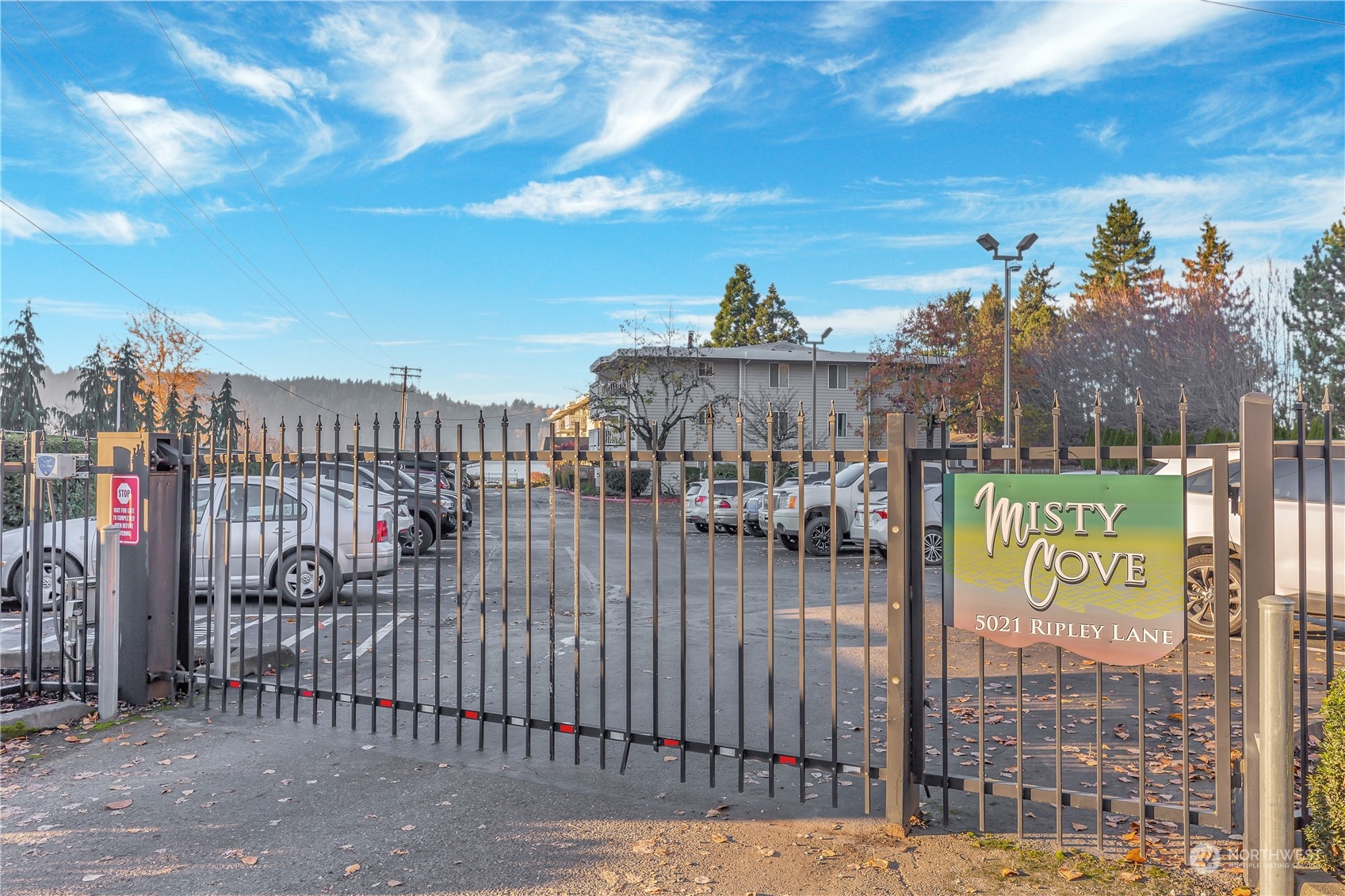 5021 Ripley Lane North, Unit 306 Renton, WA 98056 - Photo 22 of 22 a view of a building with a sign board