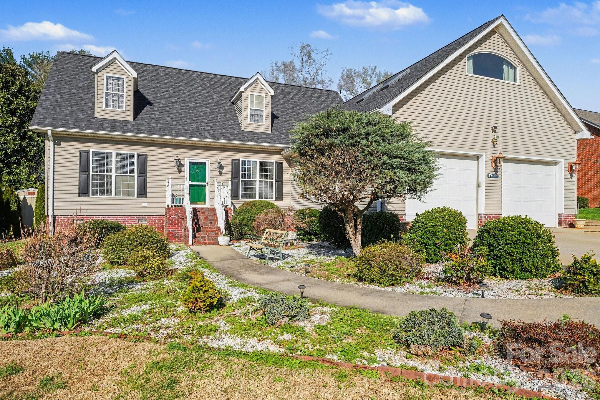 212 Pine Valley Road Mocksville, NC 27028 - Photo 2 of 28 front view of a house with a yard