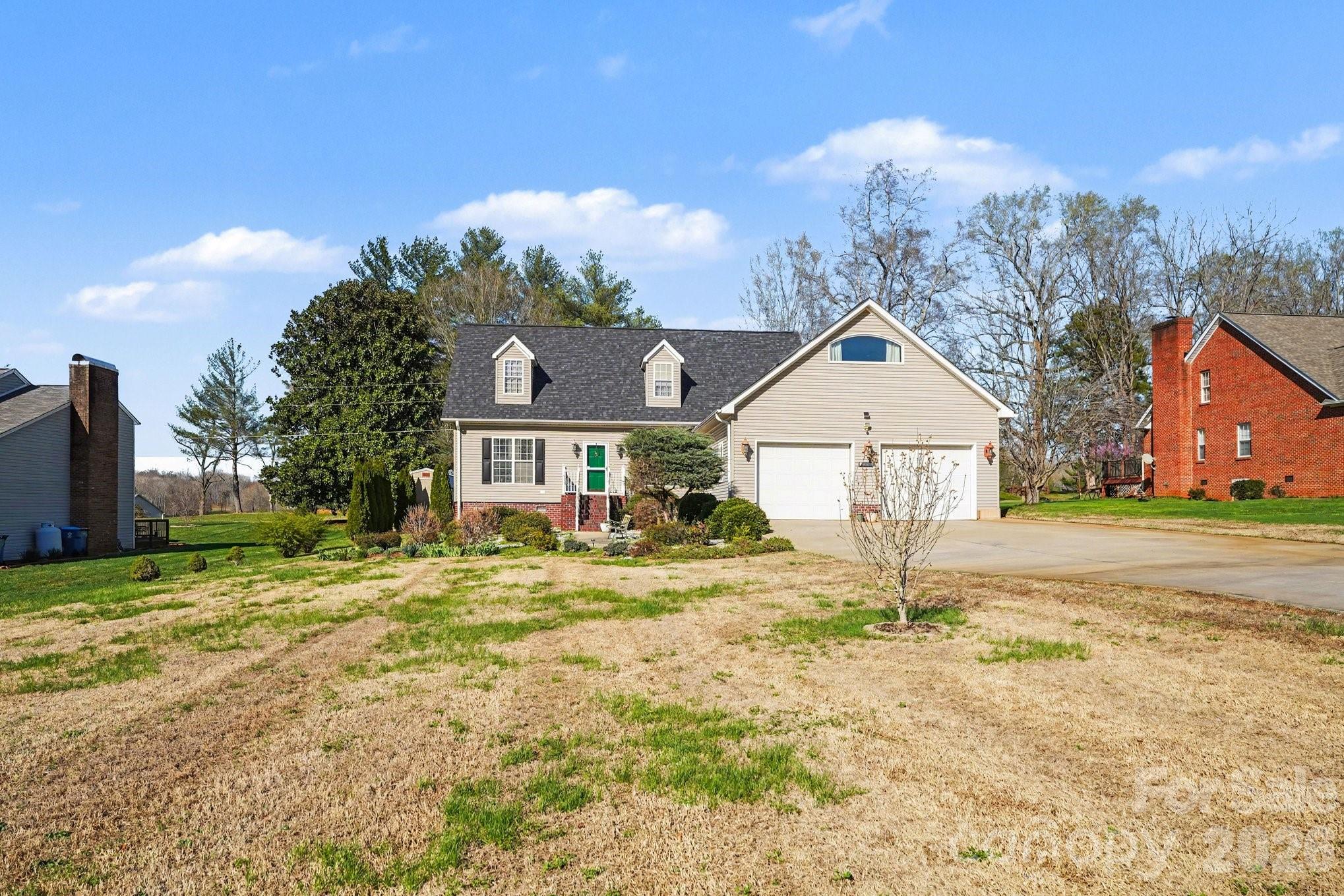 212 Pine Valley Road Mocksville, NC 27028 - Photo 3 of 28 a view of a house with a yard
