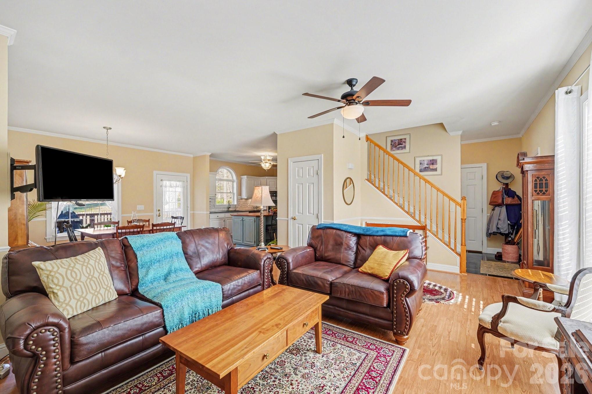212 Pine Valley Road Mocksville, NC 27028 - Photo 6 of 28 a living room with furniture flat screen tv and a lamp