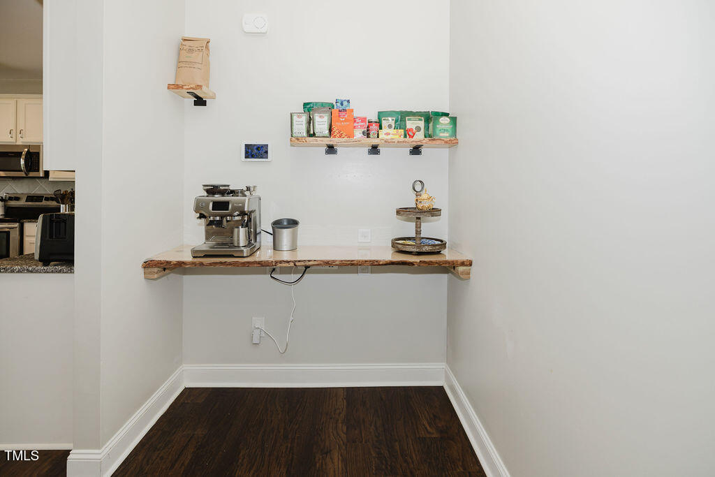 105 Perignon Drive Princeton, NC 27569 - Photo 10 of 38 a view of kitchen with baby cabinets and black appliances