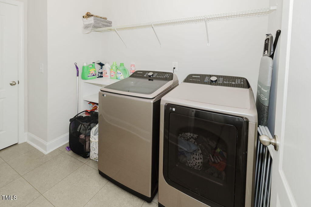 105 Perignon Drive Princeton, NC 27569 - Photo 20 of 38 a utility room with dryer and washer