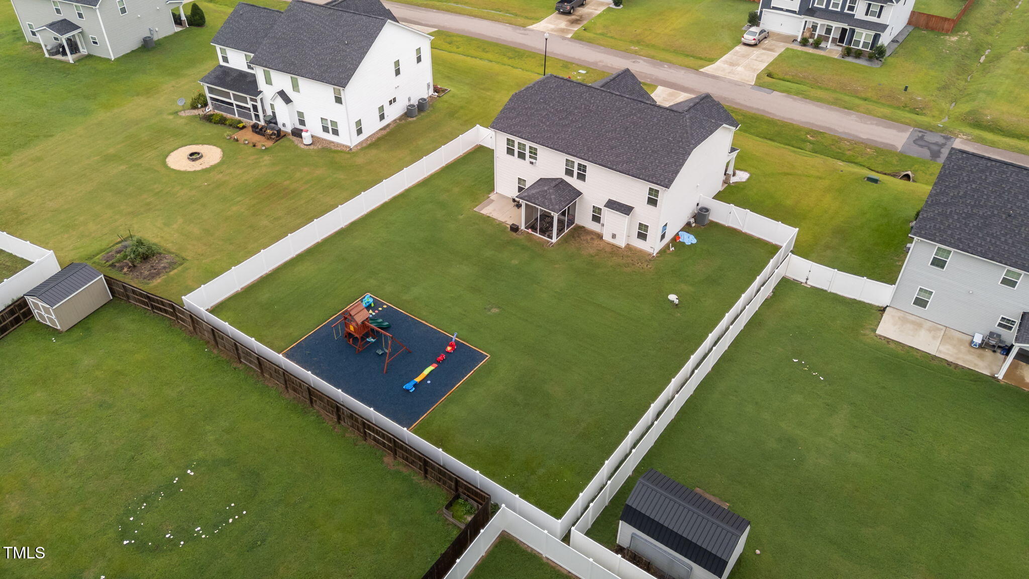 105 Perignon Drive Princeton, NC 27569 - Photo 32 of 38 an aerial view of a pool