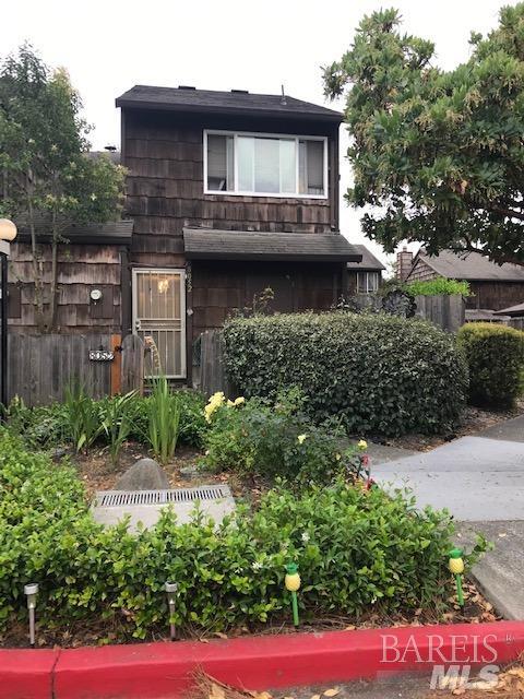 8052 Sunflower Drive Cotati, CA 94931 - Photo 1 of 1 a front view of a house with garden